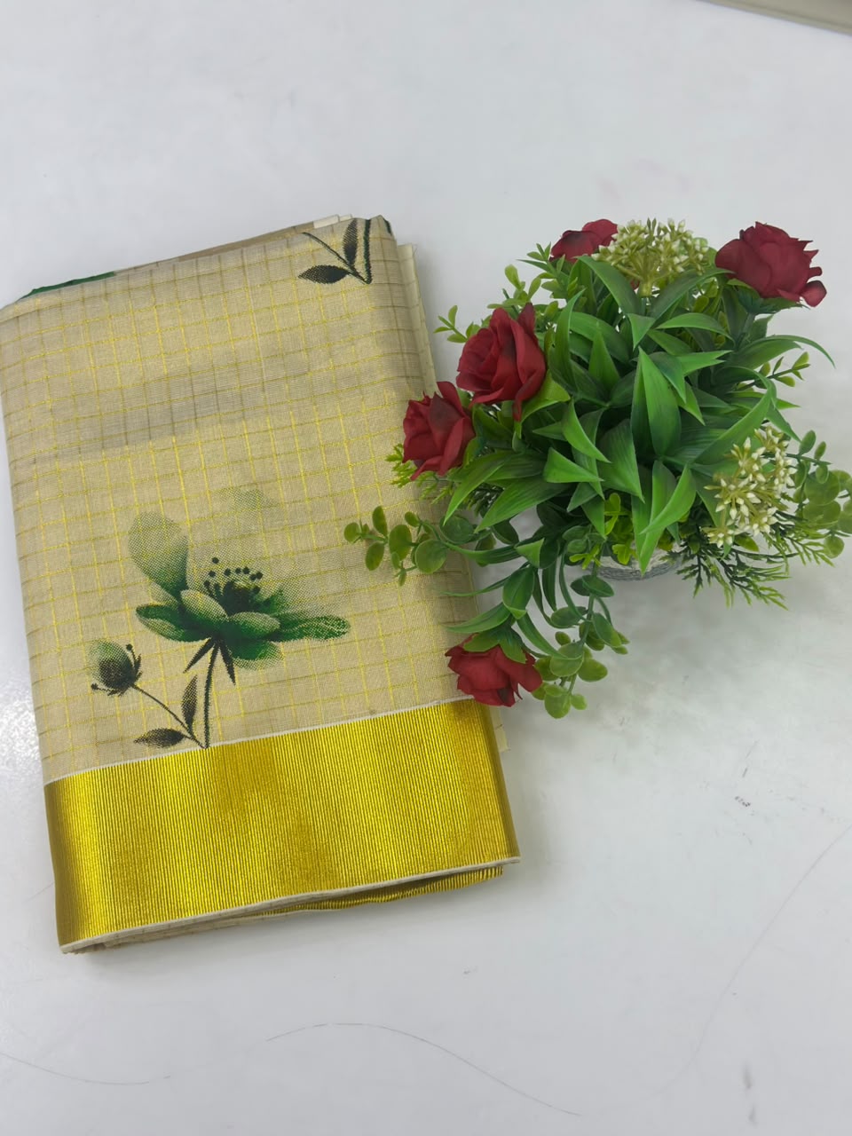 Kerala Kasavu Saree with Green Floral Print