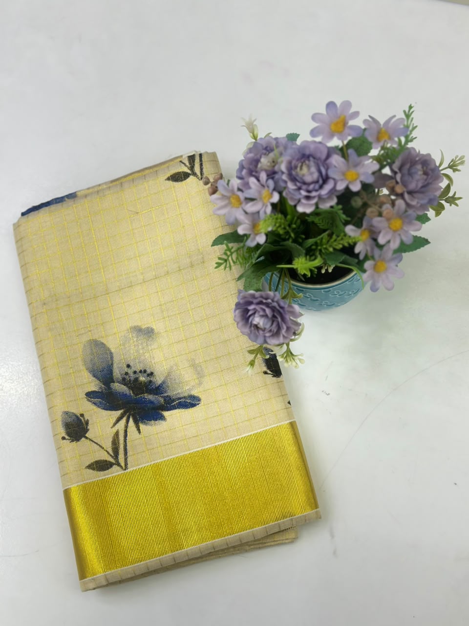 Kerala Kasavu Saree with Navy Floral Print